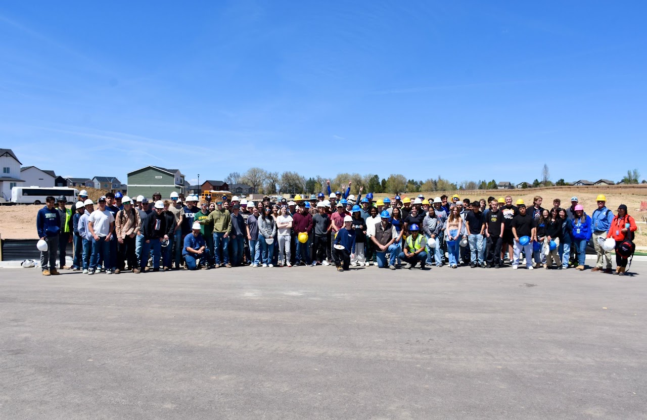 BUILT NoCO students gathered at a job site